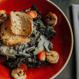 Melnā Bite Cibo