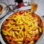 Retourner Pizzeria Comida