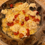 Mezzogrammo Nourriture