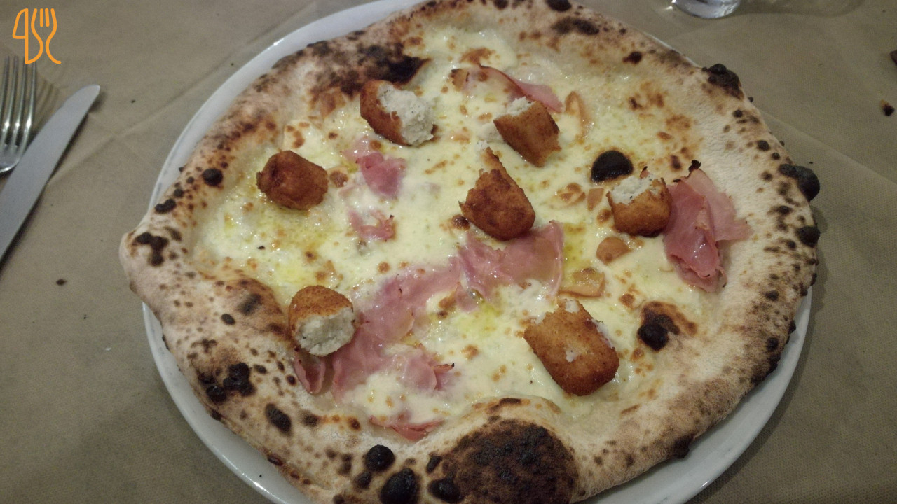Nero's Braceria Pizzeria Comida