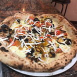 Mezzogrammo Nourriture