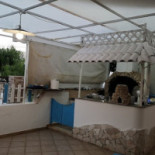 Mg 34 Trattoria E Pizzeria À l'intérieur