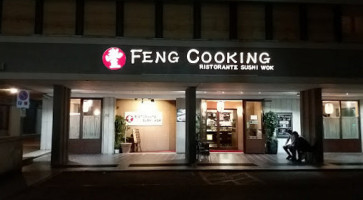 Feng Cooking outside