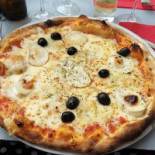 L˜aria Comida