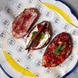 Sciué Premuda Comida