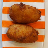 Sciué Premuda Comida